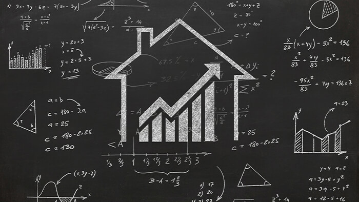 real estate math on a chalk board GRI